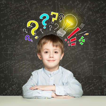 Child boy with lightbulb. Concept Ideas and projects. 