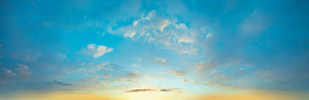 Blue sky clouds background. Beautiful landscape with clouds and orange sun on sky