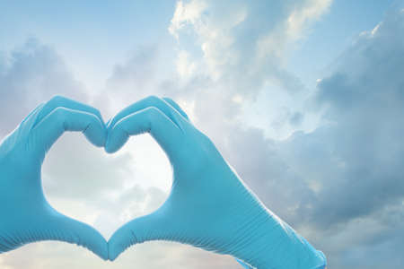 Heart against sky clouds. Save life conceptの写真素材