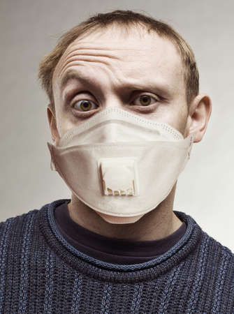 Surprised man in protective mask portrait