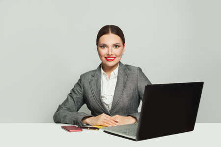 Working businesswoman sitting in office