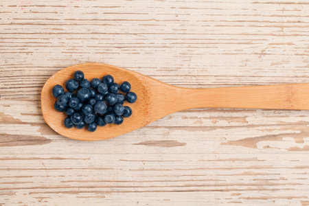 Blueberries on white wooden board background. Healthy eatingの写真素材