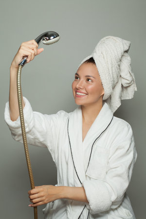 Spa beauty woman in white bathrobe with shower, female routineの写真素材
