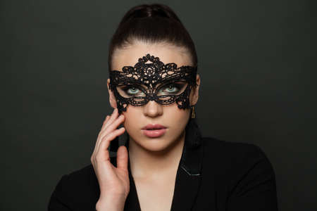 Young woman with blak maskの写真素材