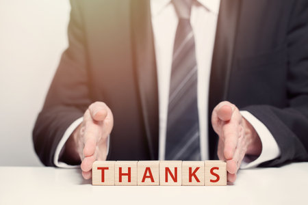 Wooden blocks with word thanks,  business feedback thanks conceptの写真素材