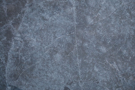 Gray rocky stone background with cracksの写真素材