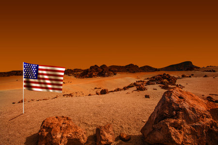 Planet landscape with American flag. Cosmic scene with desert, stone, sand and red martian heaven backgroundの写真素材