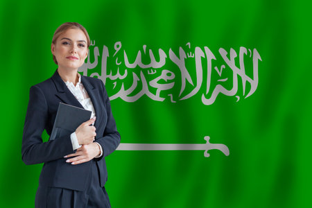 Saudi Arabian businesswoman on the flag of Saudi Arabia digital  nomad, business, startup conceptの写真素材