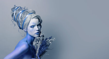 Lovely creative fashionable carnival model woman blonde, fashion beauty studio portraitの写真素材