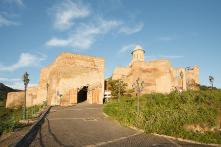 The Virgin Mary Assumption Church of Metekhi in Tbilisi on the background of blue sky