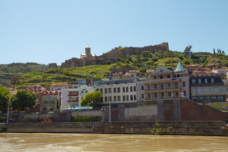 Beautiful landscape of historical Tbilisi, Kura river and fortress on the backgroundの写真素材