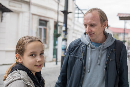 Happy family together. Young girl daughter and her father portraitの写真素材