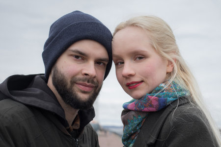 Happy couple portrait. Young woman with blond hair and handsome man outdoors.の写真素材