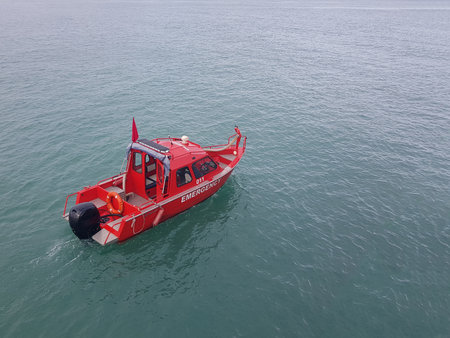 Coast guard boat through the sea, top viewの写真素材