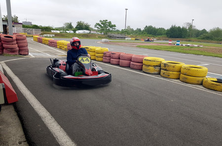 Person go-karting on a motor racing trackの写真素材