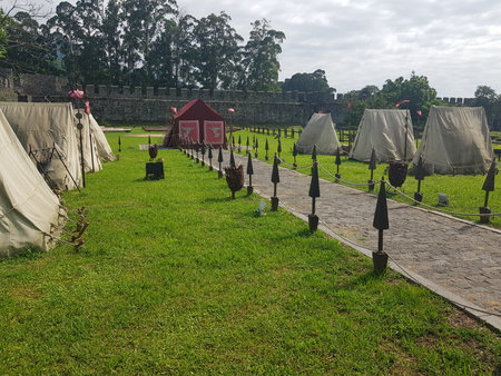 Ancient Roman Encampment on Green Grass at a Historical Reenactment in Roman Fortress. Ancient Historyの写真素材