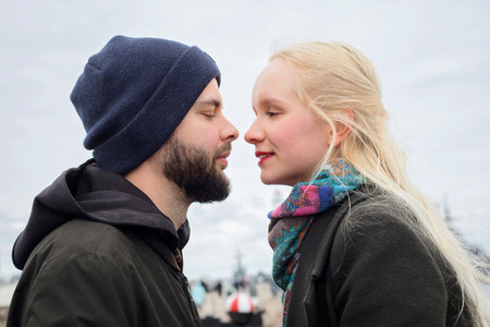 Happy lovers man and woman outdoors portrait