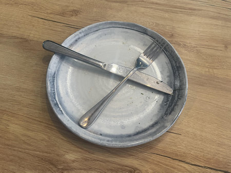 plate isolated on wooden table