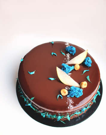Chocolate cake with hazentuts and blue spongeの写真素材