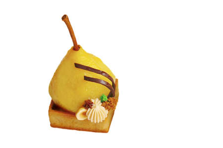 Poached pear tart with hazelnuts, soft sponge and hazenut ganacheの写真素材