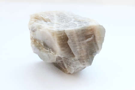 Moon stone with textured surface isolated on white backgroundの写真素材