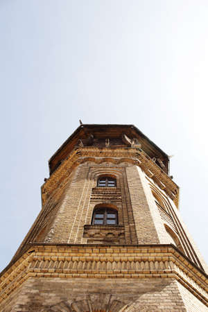 Old water tower building yellow brick wall European architecture tower topの写真素材