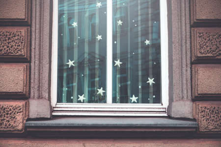 Fairy tale mysterious window in soft light with stars and blue shade