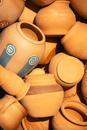 Variety of randomly placed clay pots close up