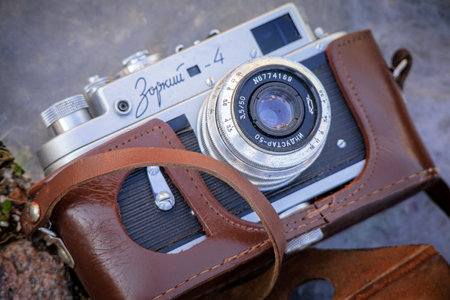 Daugavpils, Latvia - 16 09 2023: Vintage GORKY-4 black camera with INDUSTAR-50 in brown leather case at flea marketのeditorial素材