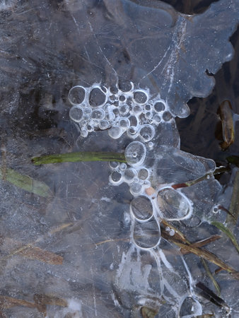 Layers of Ice with Trapped Air Bubblesの写真素材