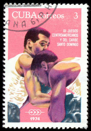 CUBA-CIRCA 1974 : A post stamp printed in Cuba shows Boxing, series 12th Central American and Caribbean Games, Santo Domingo, circa 1974のeditorial素材
