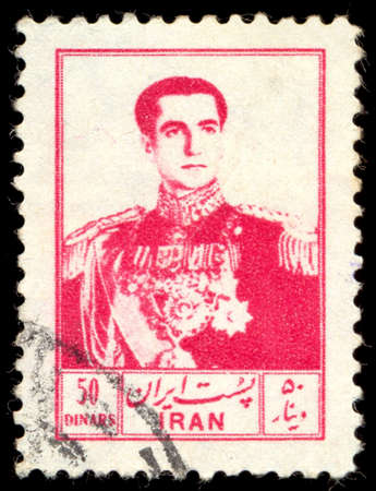 IRAN - CIRCA 1954: A stamp printed in Iran shows portrait of Mohammad Reza Shah Pahlavi (1919-1980), circa 1954のeditorial素材