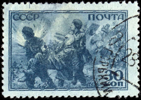 USSR - CIRCA 1943: A stamp printed in the USSR shows nurses in ww2 war, circa 1943.のeditorial素材