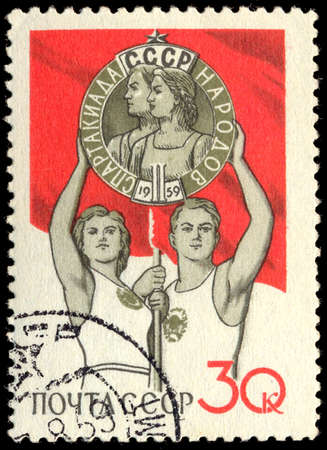 USSR - CIRCA 1959: A stamp printed in USSR (Russia) shows \"II Spartakiad of people of the USSR\", circa 1959のeditorial素材