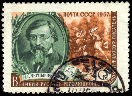 USSR - CIRCA 1957: A postage stamp printed in the USSR shows portrait of famous russian writer Chernyshevsky, circa 1957のeditorial素材