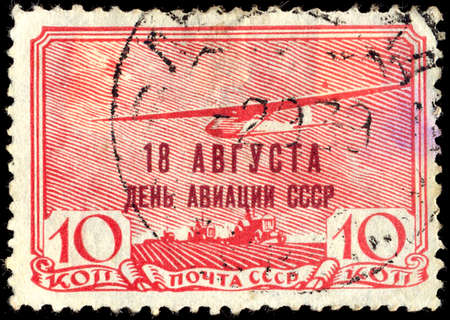 RUSSIA - CIRCA 1939: A Postage Stamp Printed in the USSR Shows August 18th as a Day of the USSR Aviation, circa 1939のeditorial素材