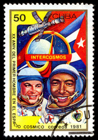 CUBA - CIRCA 1981: A stamp printed in CUBA, 20th anniversary first flight into space , 50 centavos, cosmonaut Yuri Romanenko Arnaldo Tamayo Mendez ,circa 1981のeditorial素材