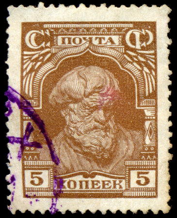 USSR - CIRCA 1923: A Used Postage Stamp showing the Old Peasant. Brown Print, circa 1923.のeditorial素材