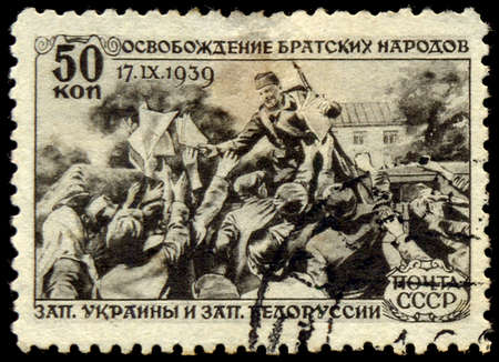 USSR - CIRCA 1940: A Stamp printed in the USSR shows the release of the fraternal peoples of the Red Army, circa 1940のeditorial素材