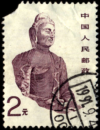 CHINA - CIRCA 1993: A Stamp printed in China shows image of ancient Buddha statue, circa 1993のeditorial素材