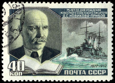 RUSSIA - CIRCA 1952: A stamp printed in USSR, shows portrait of the Alexey Novikov-Priboy (1877-1944) was Russian writer, circa 1952のeditorial素材