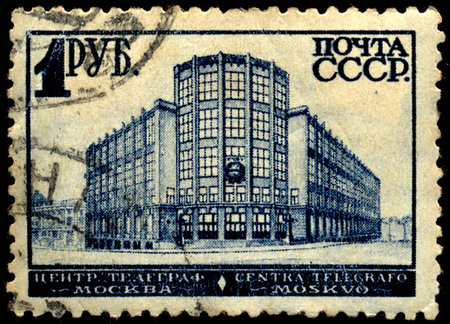 USSR - CIRCA 1932: A stamp printed in USSR shows Central Telegraph building in Moscow (Engineer,...