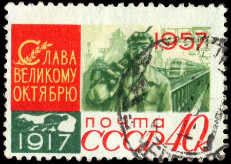 USSR - CIRCA 1957: A stamp printed in the USSR, with an inscription \"Glory of great October\", circa 1957のeditorial素材
