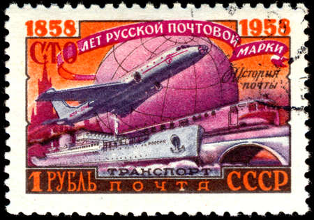 RUSSIA - CIRCA 1958: stamp printed by Russia, shows Ship, plane, train and globe, circa 1958のeditorial素材