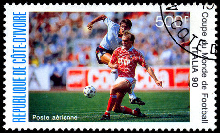 COTE D\'IVOIRE - CIRCA 1990: A stamp printed in COTE D\'IVOIRE shows Soccer, England and USSR, World...