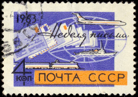 USSR - CIRCA 1963: A stamp printed in the USSR, shows Ship, plane and train, circa 1963のeditorial素材