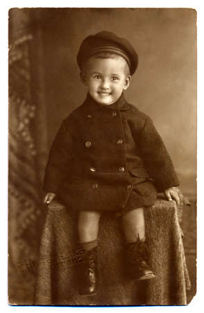 RUSSIA - CIRCA 1926 Vintage photo shows studio portrait of an unidentified a little boy posing as actorのeditorial素材
