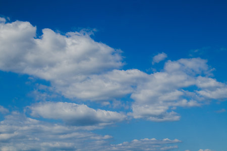 Beautiful blue sky There is a group of white clouds in a beautiful shape.の写真素材