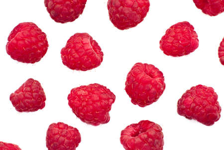 Isolated juicy raspberries on a white backgroundの写真素材