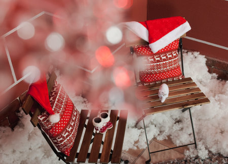 Christmas decoration with pillow, baby's bootees and snow